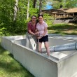Catriona and Gail standing in the tanks for the septic system before they are put in place.