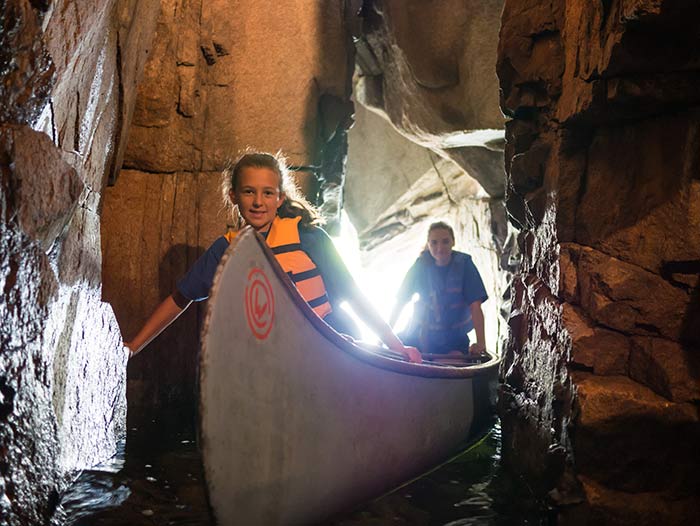 Canoeing inside Hawthrone's Cave